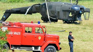 Apvirtęs UH-1 sraigtasparnis