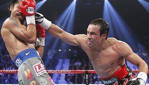 &Scaron;e&scaron;tajame raunde varžovą nokautavęs J. M. Marquezas pirmą kartą įveikė M. Pacquiao