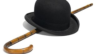 Charlie Chaplino skrybėlė ir lazdelė