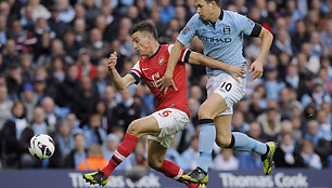 Laurentas Koscielny ir Edinas Džeko 