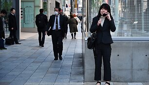 Japonė kalba telefonu / CHARLY TRIBALLEAU / AFP