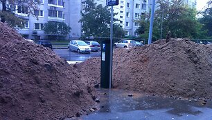 Mokėjimas už parkavimą tik su guminiais batais?