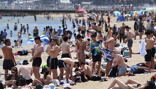 Australijos gyventojai gali laisvai atsikvėpti: užsivėrus nuo pasaulio koronaviruso pandemiją pavyko suvaldyti