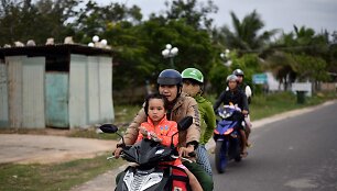 Vietnamo rezidentai evakuojasi