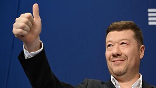 T. Okamura / MICHAL CIZEK / AFP