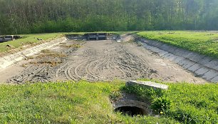 Atviras šulinys Karoliniškių lietaus nuotekų valykloje