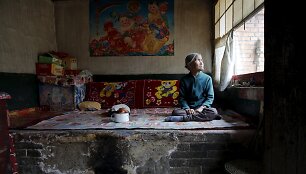 Buvusi &bdquo;paguodos moteris&ldquo; Zhang Xiantu savo namuose