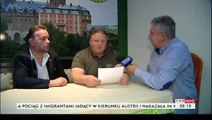 lenkijos-televizijoje-pasirode-du-vyrai-tvirtinantys-surade-mislinga-naciu-traukini