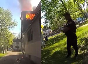 Nufilmuota: policininkas sugavo i&scaron; degančio namo metamą kūdikį