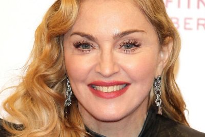 Madonna 2014-uosius metus pasitiko paviešindama iššaukiančią nuotrauką