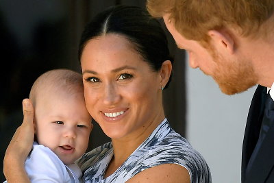 Meghan Markle su sūnumi ir princu Harry