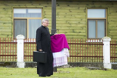 Žvagulių dukros krikštynų akimirka