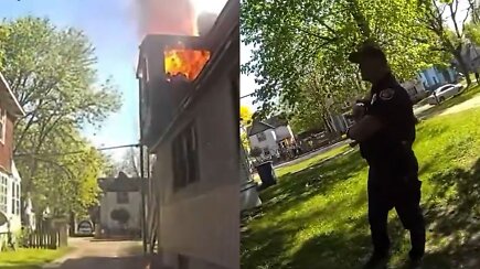 Nufilmuota: policininkas sugavo iš degančio namo metamą kūdikį