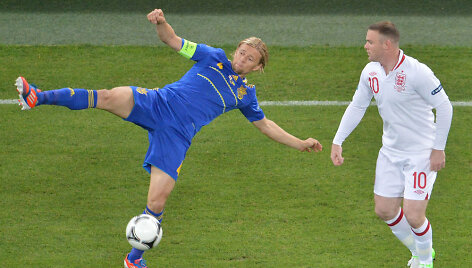 Anatolijus Timo&scaron;čiukas ir Wayne'as Rooney