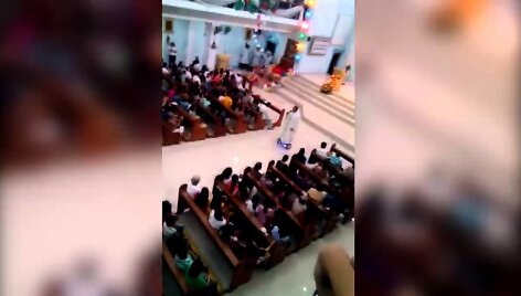 cool-priest-rides-on-his-hoverboard-during-mass