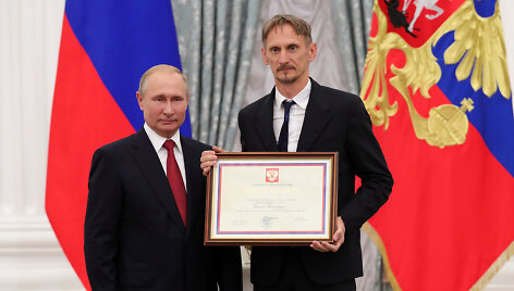 Vladimiras Putinas Kremliuje priėmė Rusijos futbolo rinktinę, kurioje dirba Gintaras Staučė.