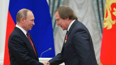 Vladimiras Putinas ir Sergejus Rolduginas