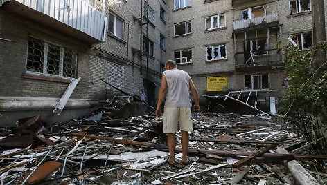 Slovjanske per susišaudymus nusiaubtas daugiabutis