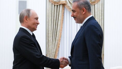 Vladimiras Putinas ir Hakanas Fidanas / ZUMAPRESS