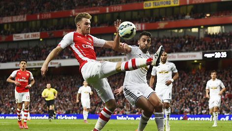 Aaronas Ramsey ir Neilas Tayloras