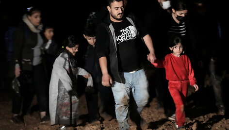 Migrantai Latvijos pasienyje