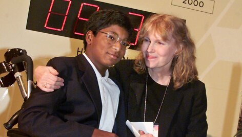 Mia Farrow su įsūniu Thaddeus 