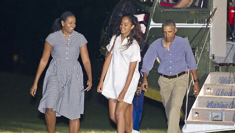 Barackas ir Michelle Obamos su dukra Malia