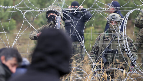 Migrantai Lenkijos pasienyje