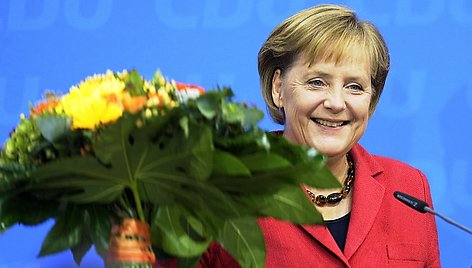 Angela Merkel švenčia pergalę.