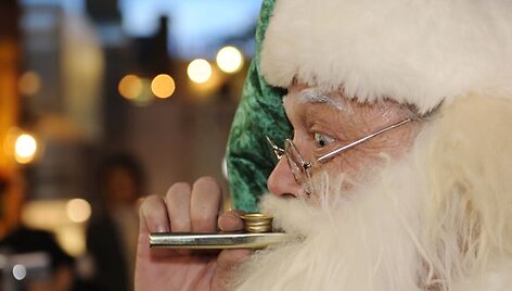Kalėdų senelis muzikuoja