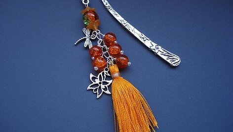 Skirtukas &bdquo;Oranžinis laumžirgis&ldquo;