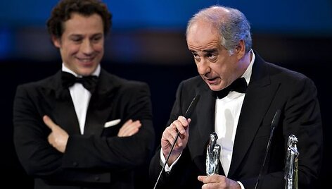 Italų aktorius Toni Servillo Garrone sako padėkos kalbą.