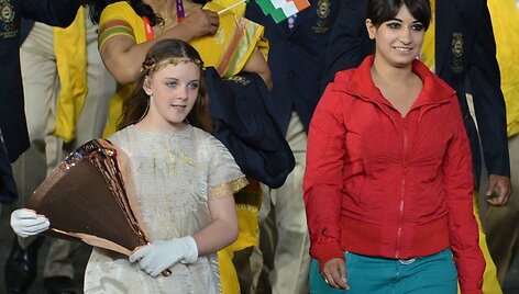 Paslaptingoji moteris (de&scaron;inėje) Indijos delegacijoje