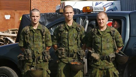 Audrius Bružas (centre) su kolegomis