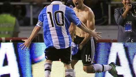 Sergio Aguero ir Leonelis Messi