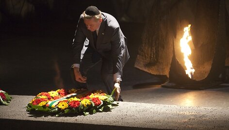 Lithuanian Foreign Minister Audronius Azubalis lays a wreath at the Hall of Remembrance during a visit to the Yad Vashem Holocaust memorial in Jerusalem on March 4, 2012.