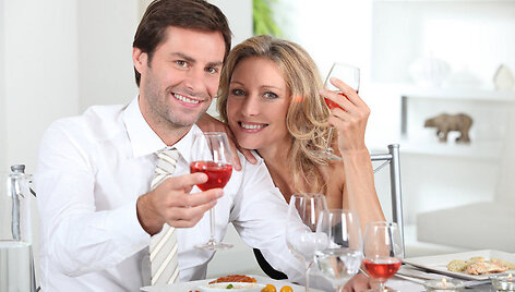 Couple eating meal at table