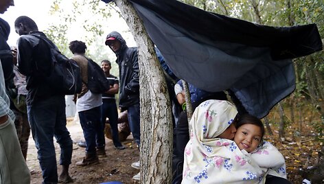 Migrantų vaikai su &scaron;ypsena