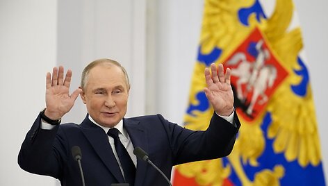 Vladimiras Putinas ir Kamila Valijeva per olimpiečių pasveikinimą Kremliuje.