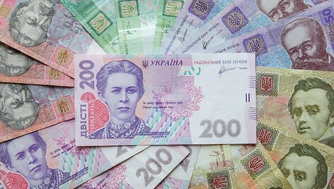 Ukrainos grivinos banknotai nuotraukoje i&scaron; Kijevo. / Konstantin Chernichkin / REUTERS