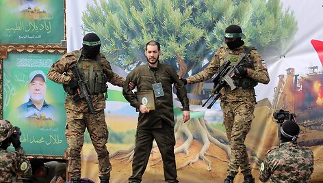 Įkaitų perdavimo ceremonija / EYAD BABA / AFP