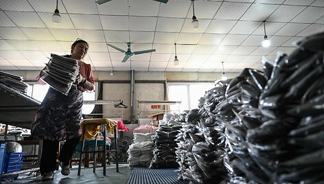 Prekės Kinijoje / JADE GAO / AFP