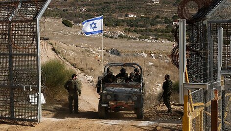 Izraelio karinės transporto priemonės Sirijoje / JALAA MAREY / AFP
