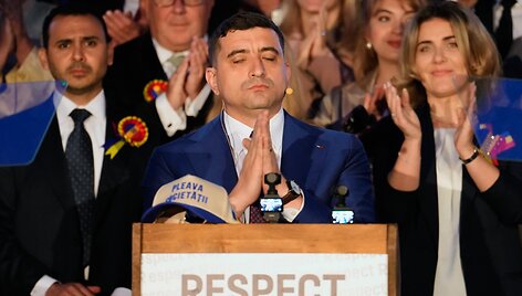 George Simionas / Vadim Ghirda / AP