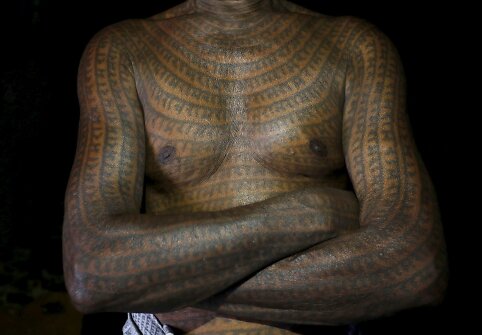 Žemiausios kastos induistai garbinantys dievą Ramą savo kūną puošia tatuiruotėmis