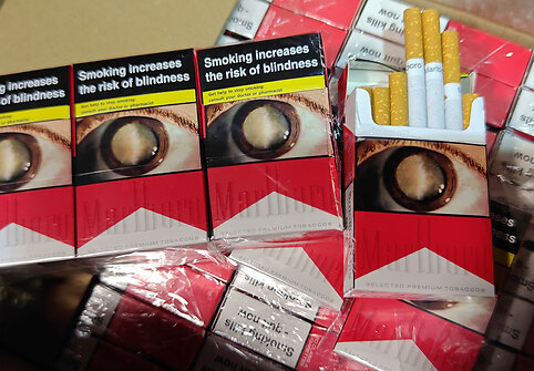 Muitinės kriminalinės tarnybos pareigūnai likvidavo nelegalaus alkoholio ir cigarečių sandėlį