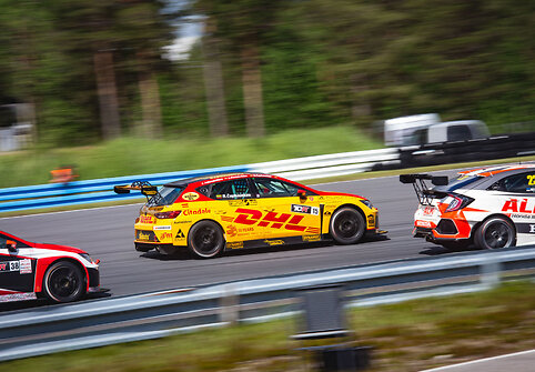  &bdquo;DHL Racing&ldquo; komandos pasirodymo akimirka