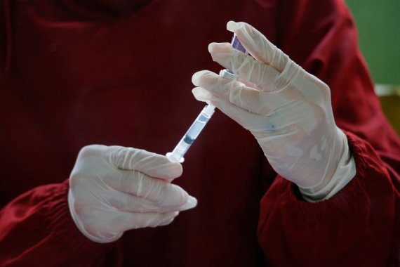 AFP/ „Scanpix“ nuotr./Vakcina