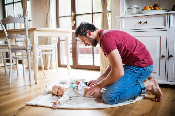 Photo from 123RF.com/Dad with a child