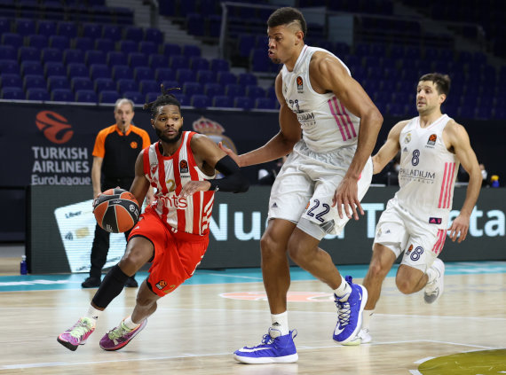 Photo from Getty Images / Euroleague.net/ Corey Walden (with ball) vs. Walter Tavares